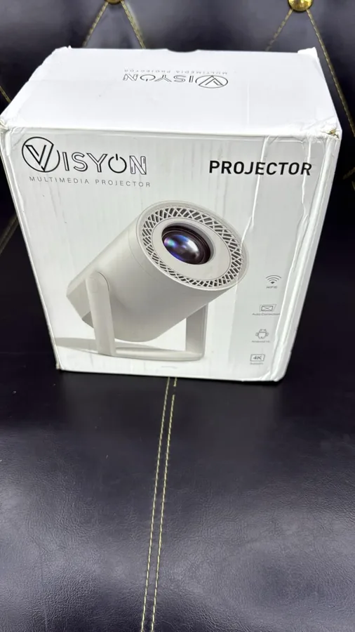 Amazon Verified Purchase customer photo showing TURN1 form-factor projector packaging